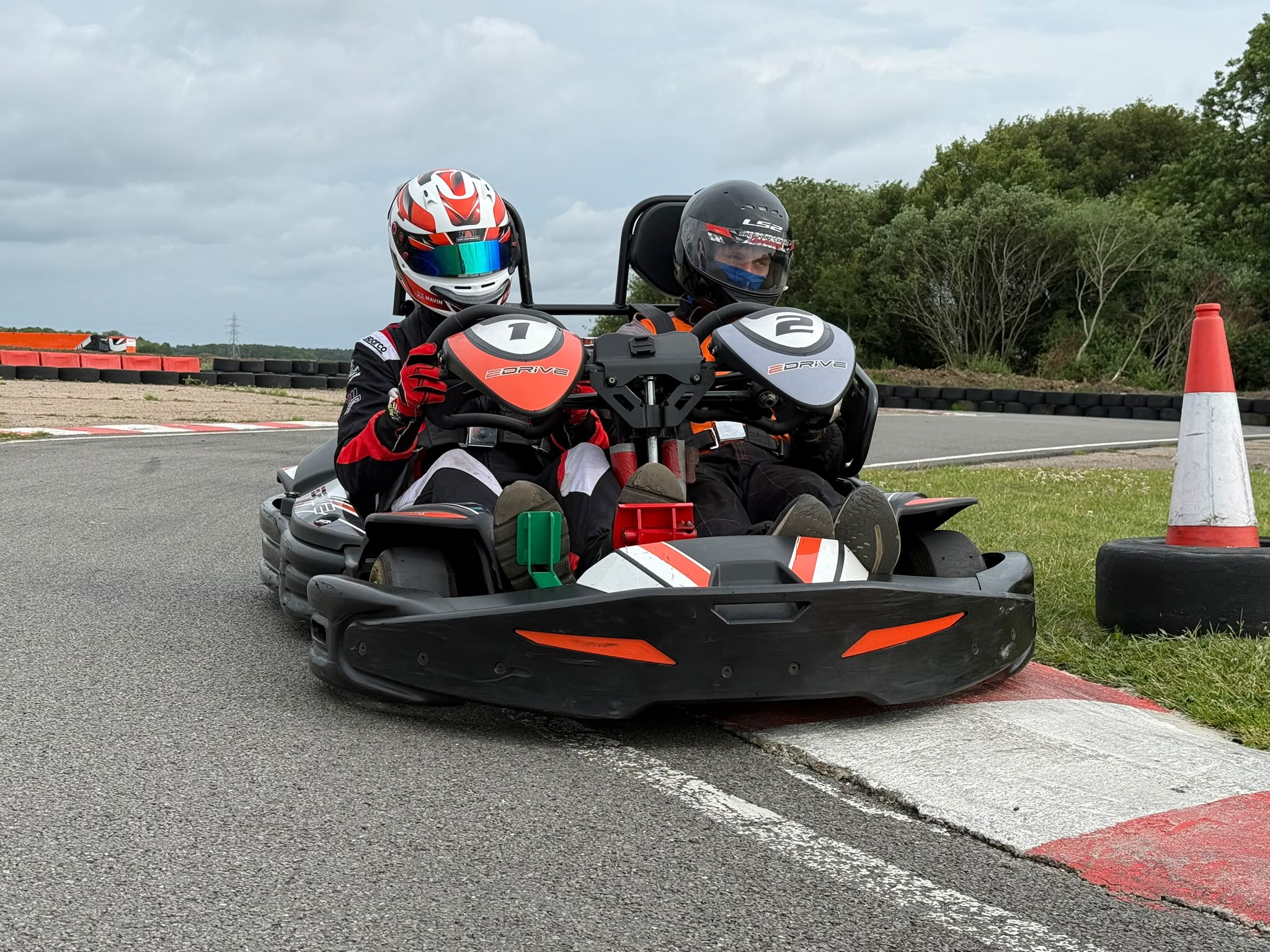 Two people enjoying the 2 seater kart together