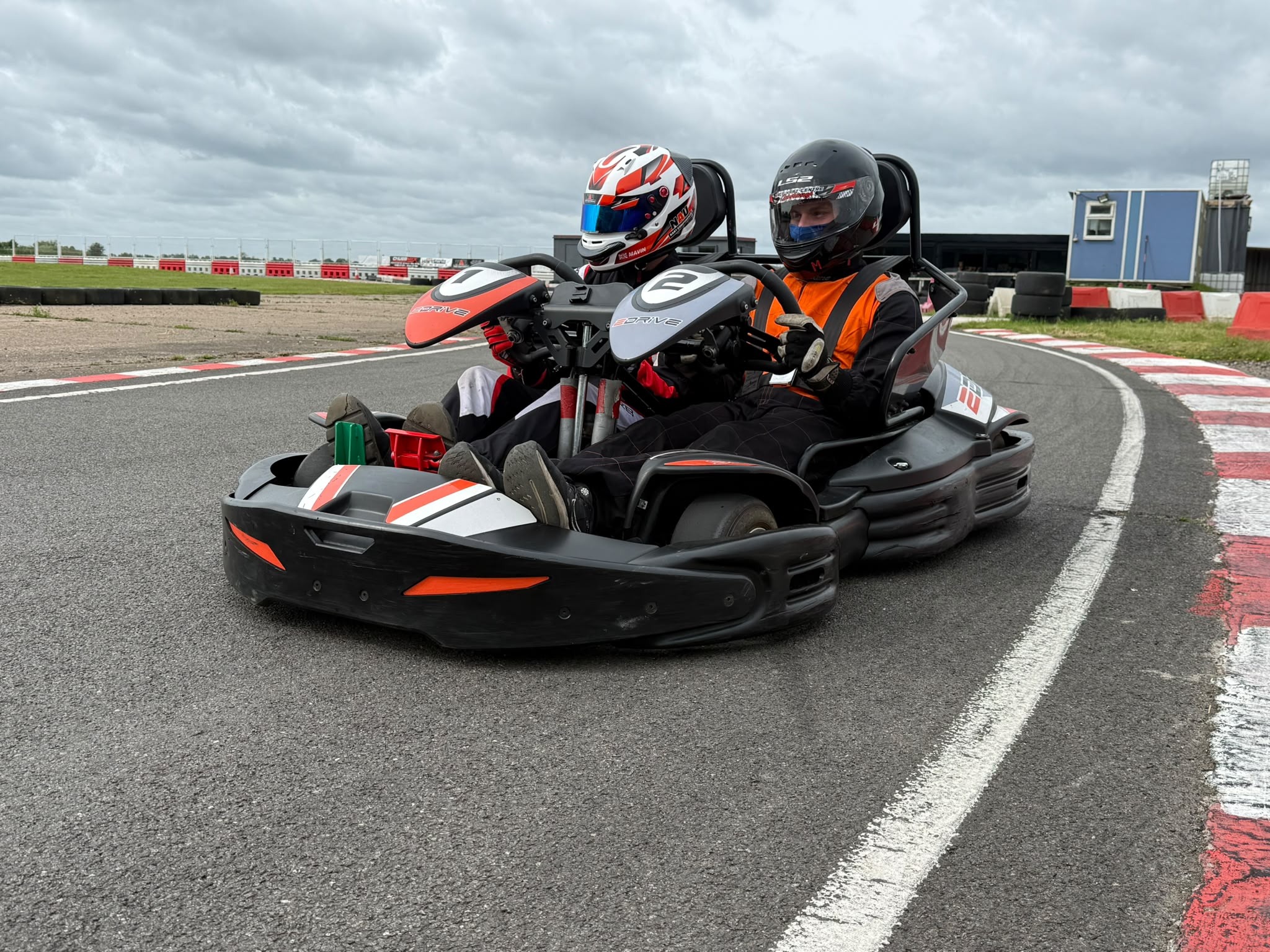 Academy instructor and student in the 2 seater kart